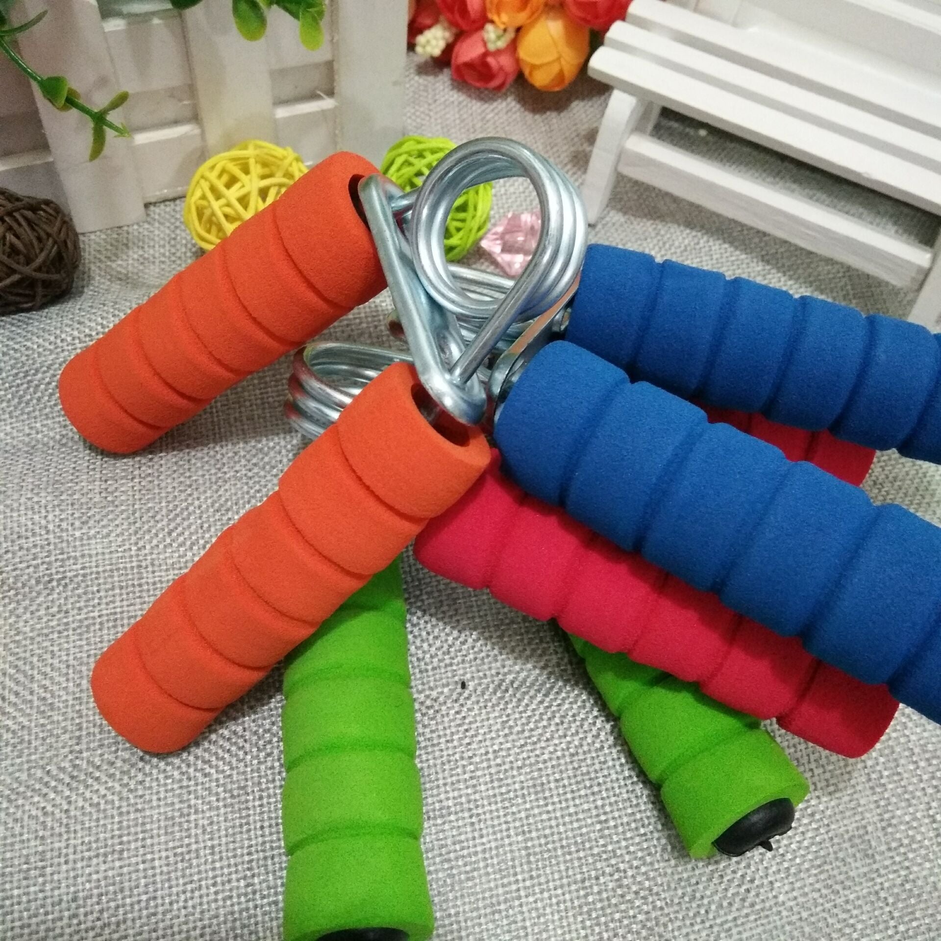 Colorful hand grip strengthener for women with foam handles for comfortable fitness training