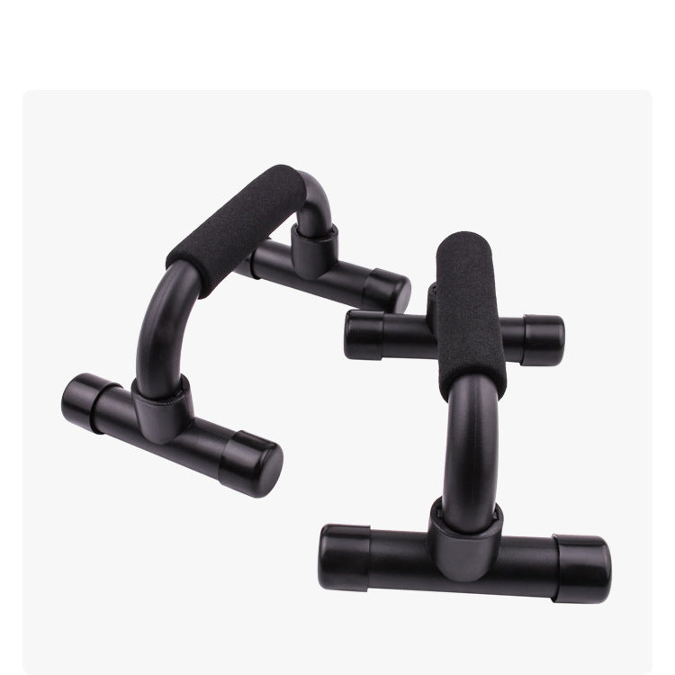 Black push-up bars with foam grips for home multifunctional fitness equipment use