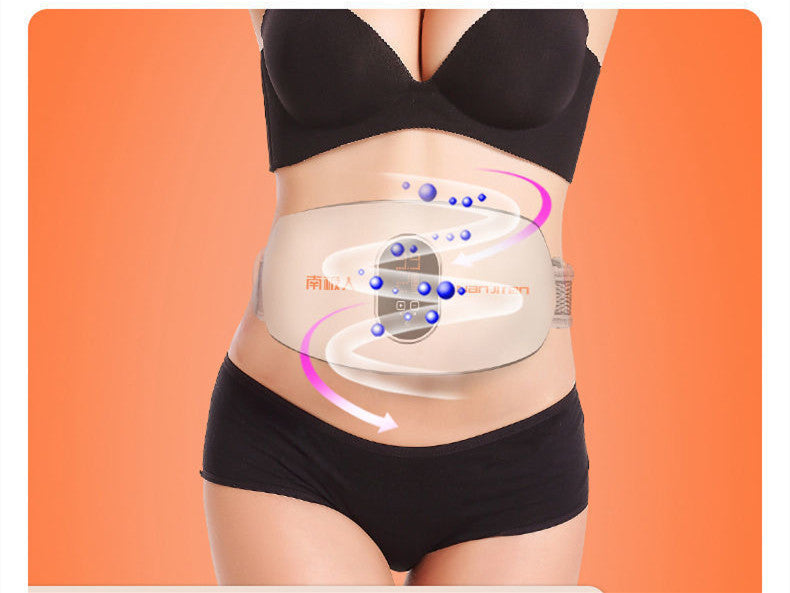 Waist slimming belt for women worn on midsection with black underwear and bra on orange background